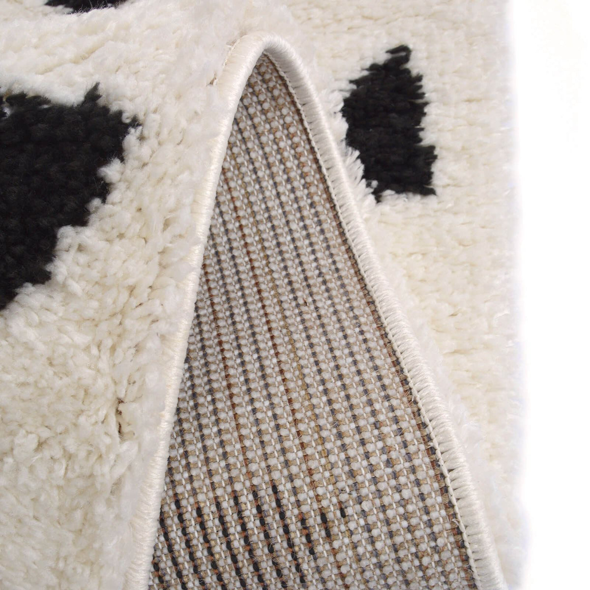 Snug Mono Triangles Rug
