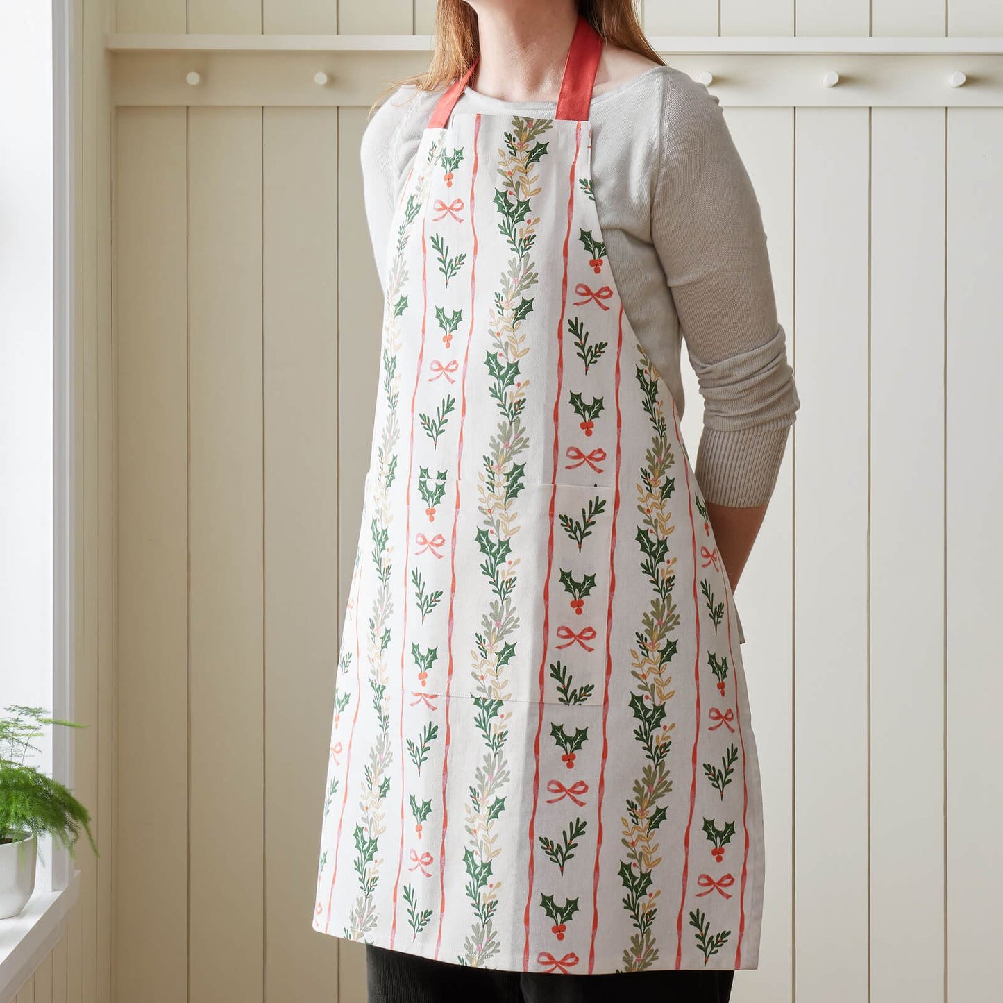 Catherine Lansfield Christmas Holly Stripe Cotton Kitchen Adult Apron Cream / Red - 70x80cm