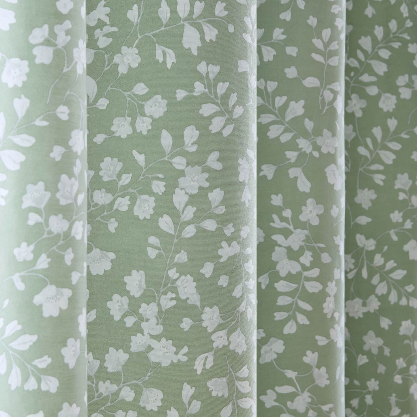 Catherine Lansfield Arla Floral Lined Eyelet Curtains Two Panels Green