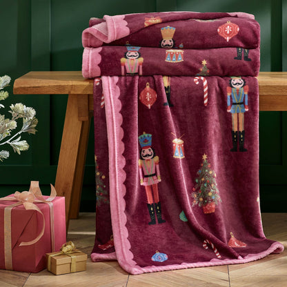 Catherine Lansfield Christmas Nutcracker Fleece Cosy Blanket Throw Plum - 130x170cm